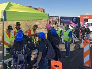 Construction Career Days. Image of teens meeting construction crews during Career Days