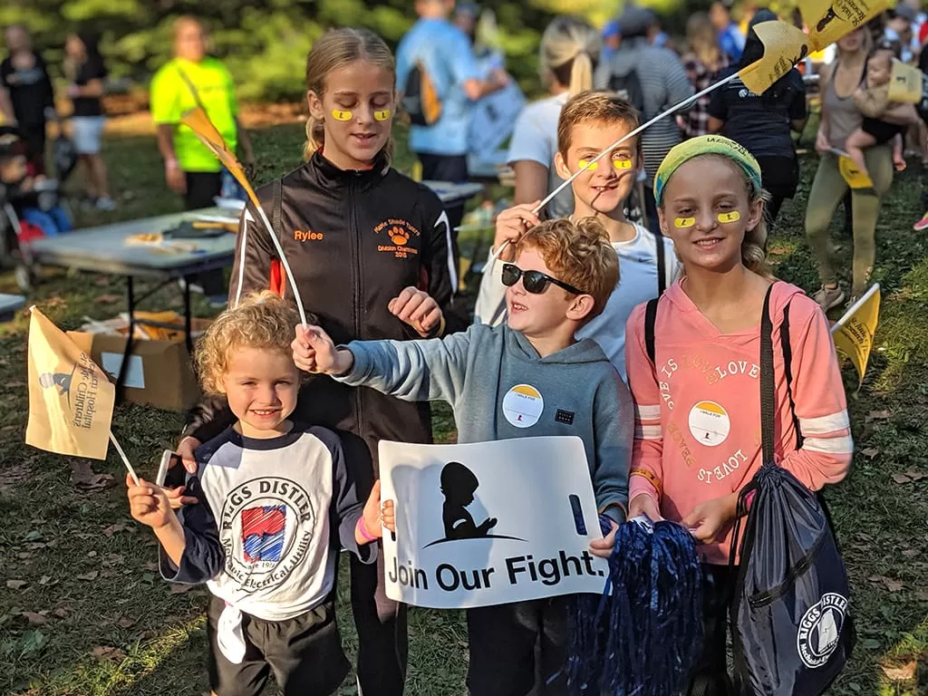 Image from the St Jude Walk Run 2019. 5 kids posing for a picture during the event