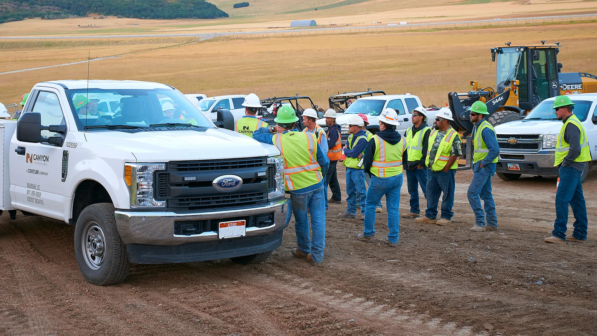 Canyon Pipeline employees on the worksite getting information for the day